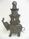 Japanese Bronze Incense Burner (Meiji Period 1868-1912), caparisoned elephant with raised trunk supporting two-tier pagoda (similar to this image from web)